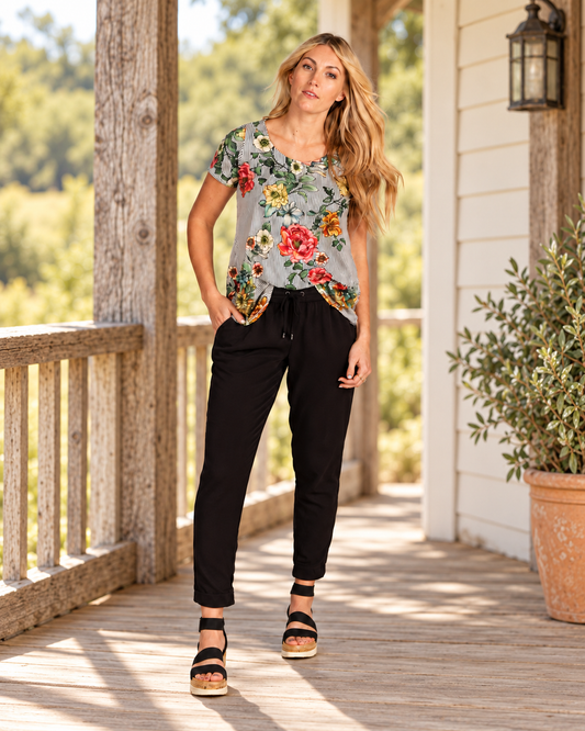 Quinn Tee styled on a rustic farmhouse porch