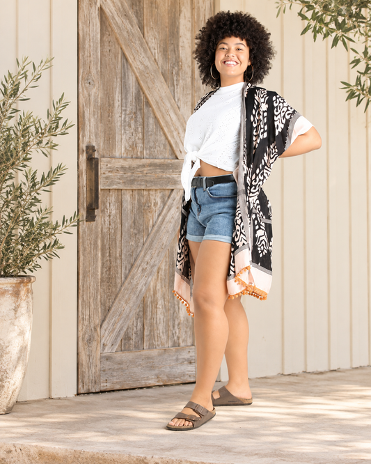 The Sienna Boho Black Kimono with Orange Pom Trim — Sparrow & Hearth rustic product photography
