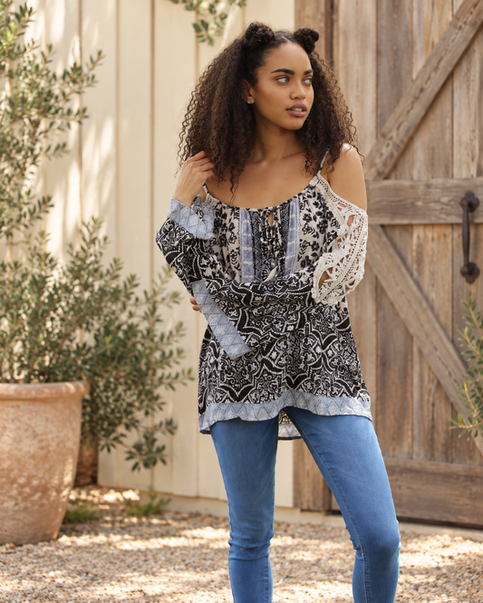 The Elara Crochet-Sleeve Cold-Shoulder Top — Sparrow & Hearth rustic product photography