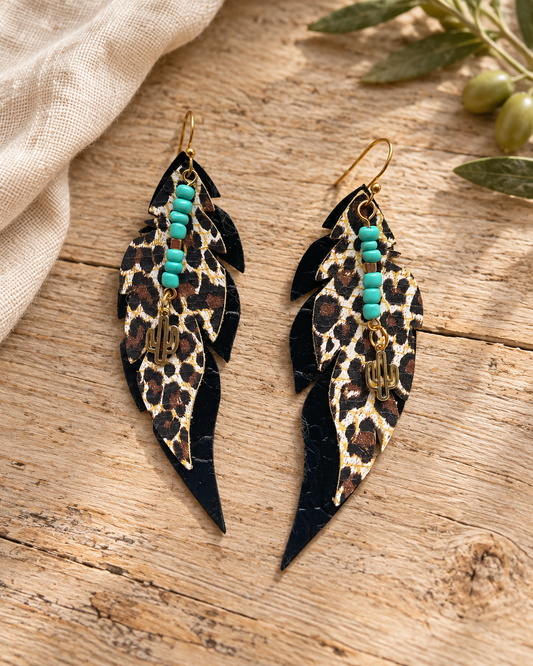 The Turquoise Feather Leopard Layered Earrings — Sparrow & Hearth rustic product photography